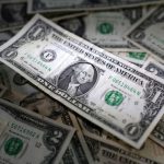 Dollar dominates on cautious Fed, Trump trade